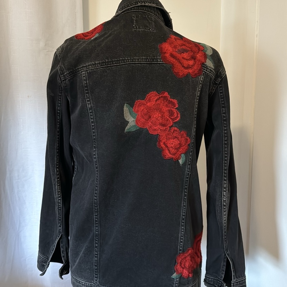 Black jeans long jacket with red flowers